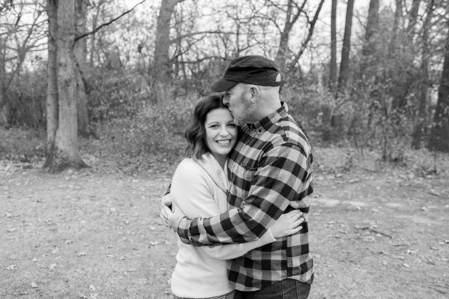 Josh and Kelly, owners of Memento Video and Design, in their black-and-white portrait